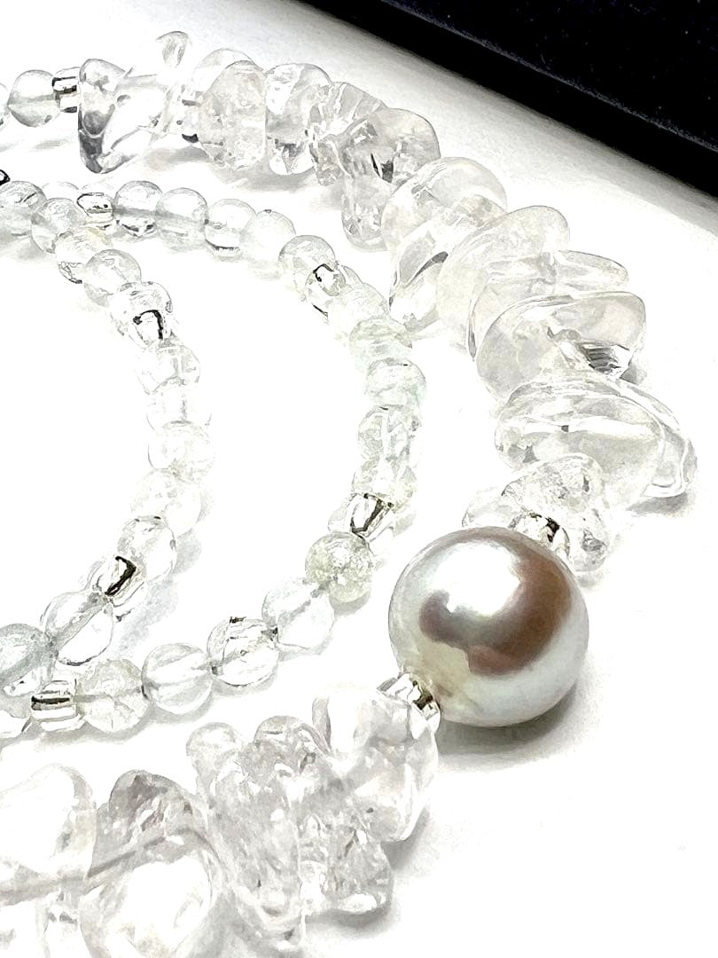 Akoya pearl necklace featuring natural 8.3 mm pearls and 3-4 mm aquamarine stones on a 40-45 cm chain