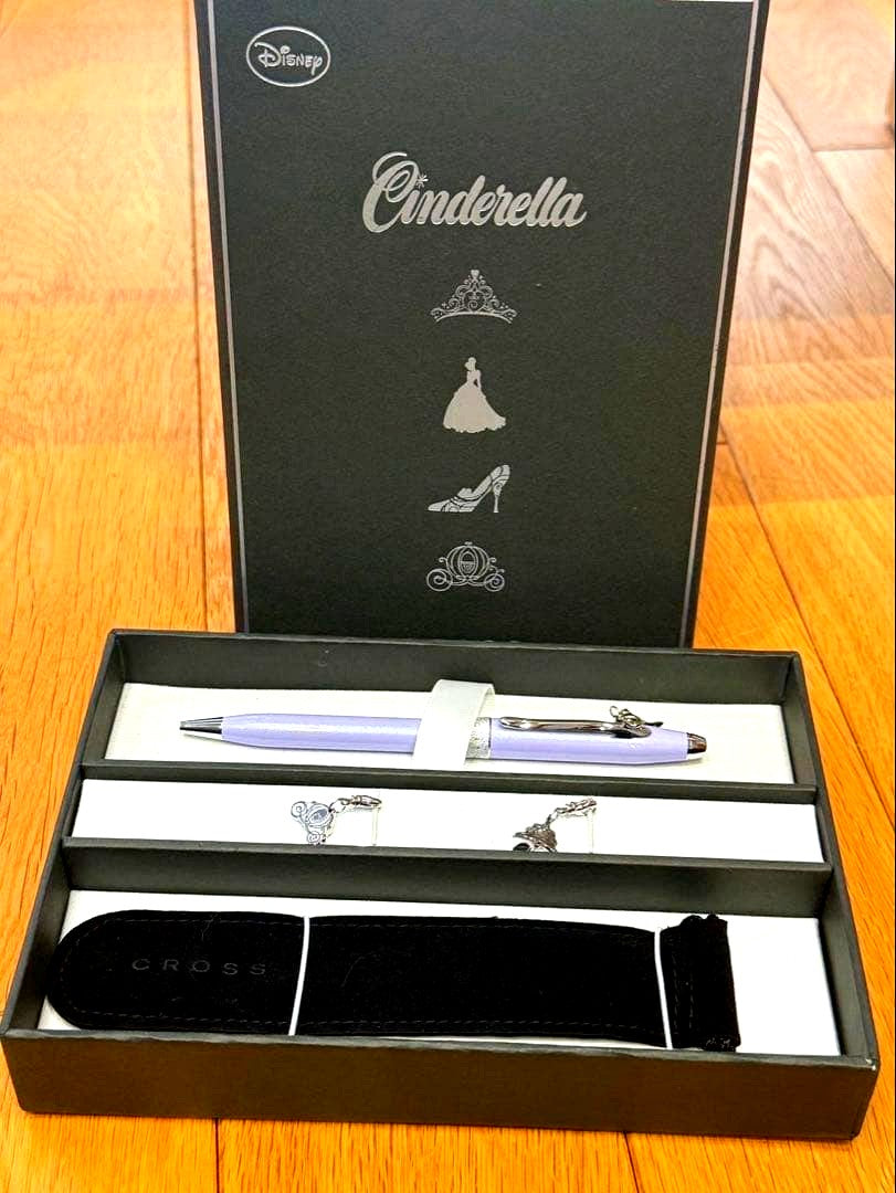 Cinderella Cross ballpoint pen in black with silver accents wrapped in protective pouch