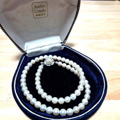 Elegant Akoya pearl necklace with white round pearls arranged in a single strand