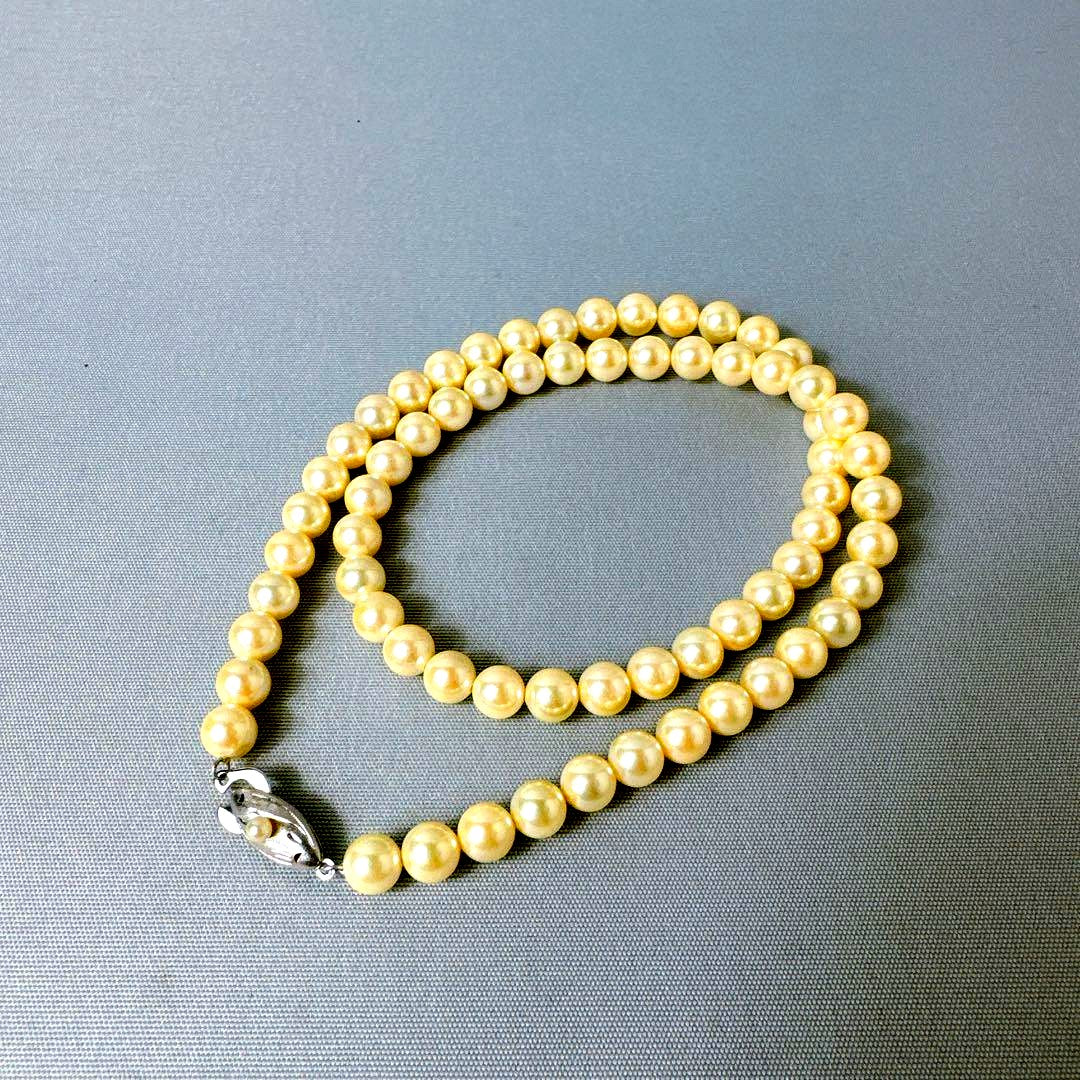 Honpa Akoya pearl necklace with 7mm round pearls and silver clasp, approximately 46cm long
