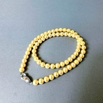 Honpa Akoya pearl necklace with 7mm round pearls and silver clasp, approximately 46cm long