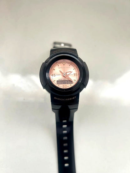 Casio G-Shock Mini GA-110 black and rose pink watch with analog and digital display