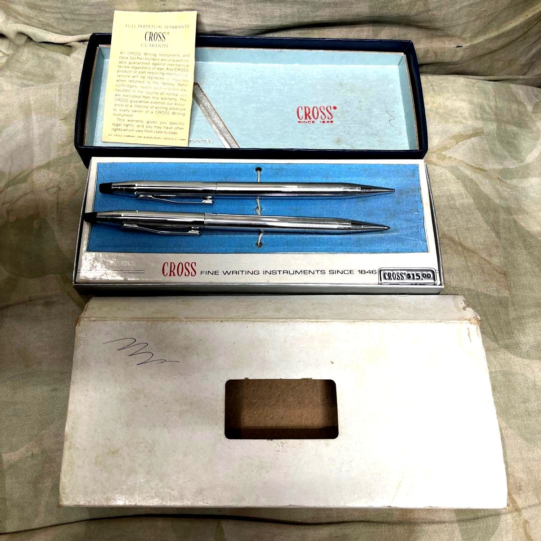 Cross silver ballpoint pen and mechanical pencil set with metal bodies and dedicated case