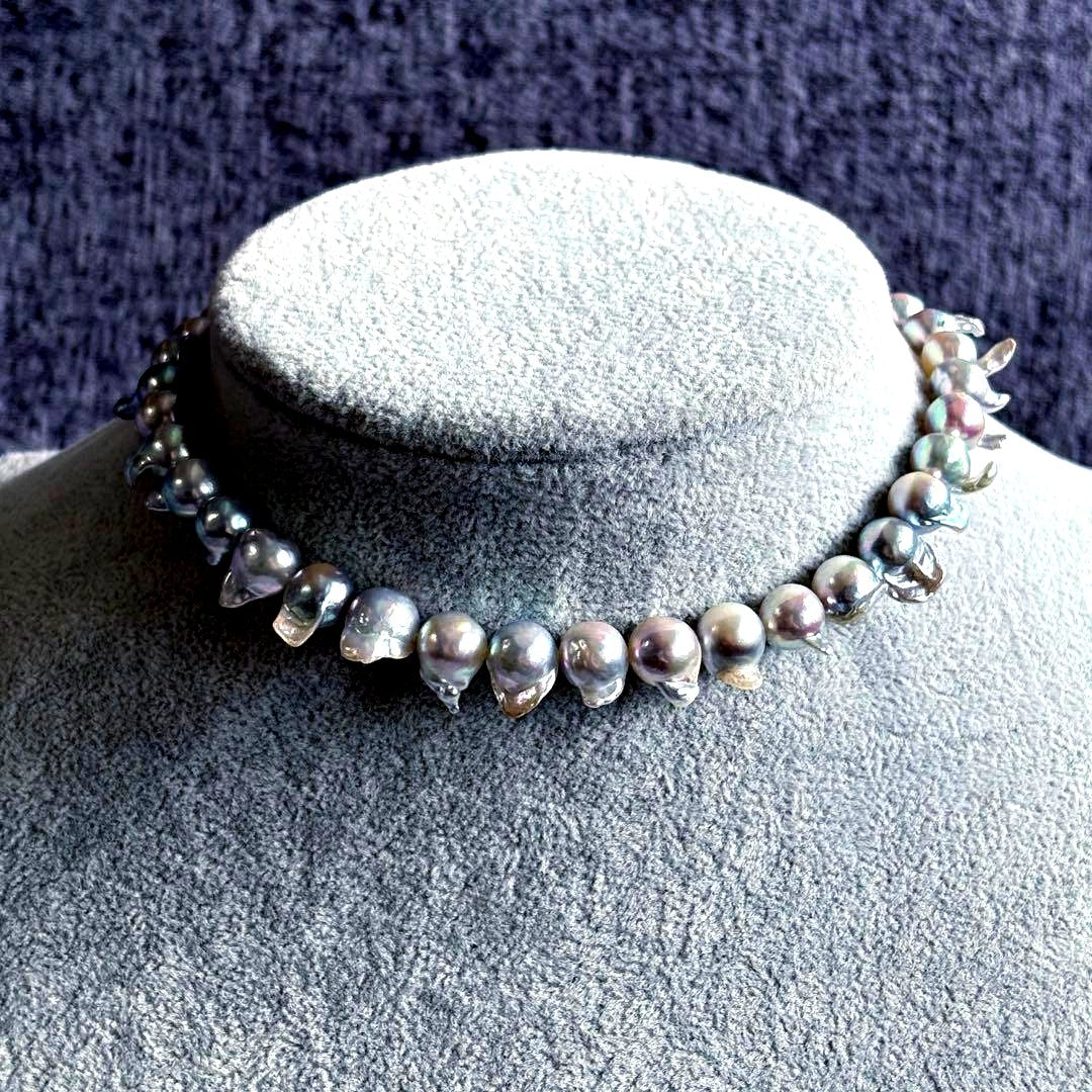 Elegant Akoya Pearl Feather Pearl Necklace with 7.5-8.7mm pearls and adjustable chain displayed on white background