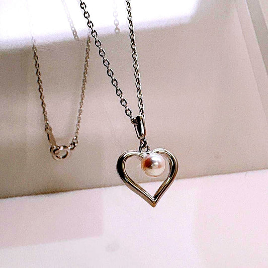 Mikimoto Heart Pearl Silver Necklace with 1.2 cm heart-shaped pearl pendant on 38 cm silver chain