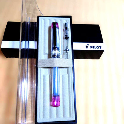 PILOT Prera Transparent Pink fountain pen with CM nib for calligraphy, shown used with visible wear