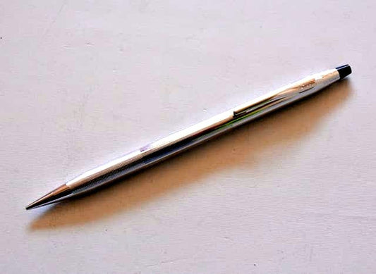 Cross brand mechanical pencil with old logo and chrome metal body made in USA