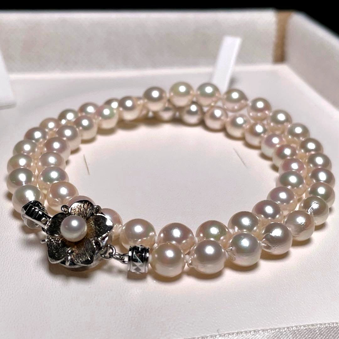 Kagayaki Hanadama Akoya pearl necklace with white semi-round pearls 6.5-7.0mm on silver chain