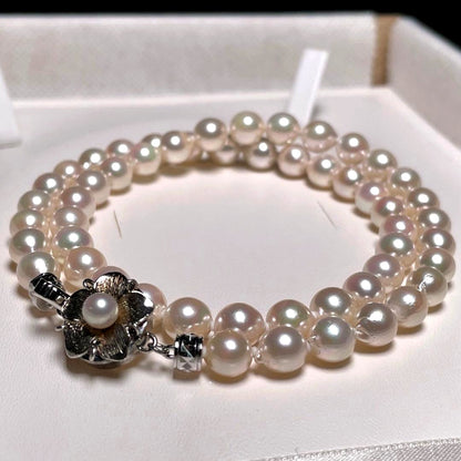 Kagayaki Hanadama Akoya pearl necklace with white semi-round pearls 6.5-7.0mm on silver chain