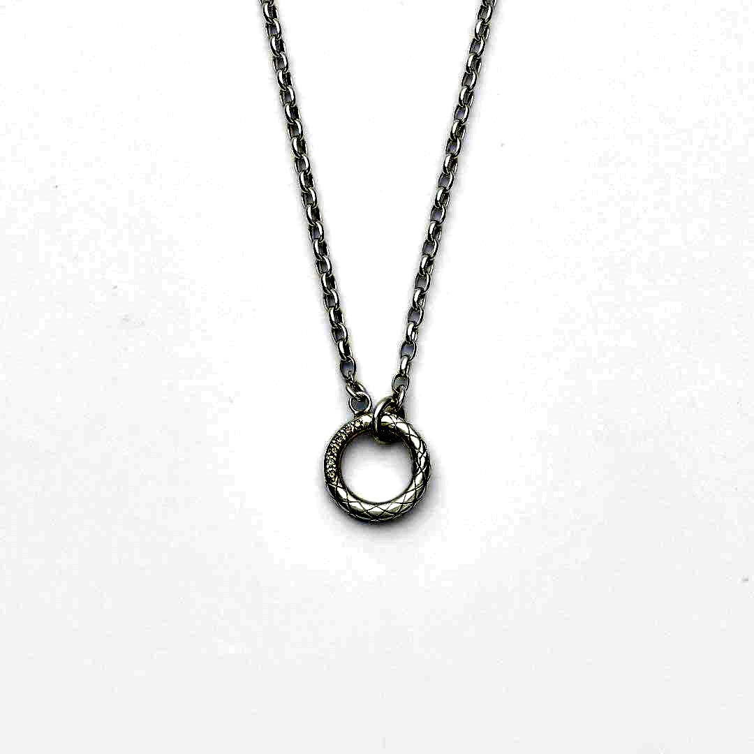 agete silver diamond necklace with a single sparkling diamond on delicate chain