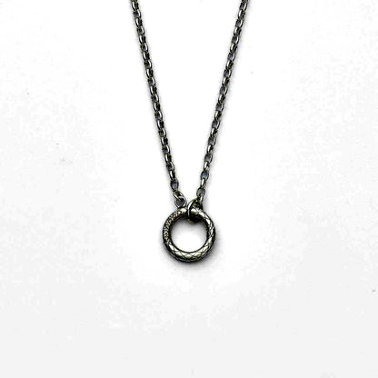 agete silver diamond necklace with a single sparkling diamond on delicate chain
