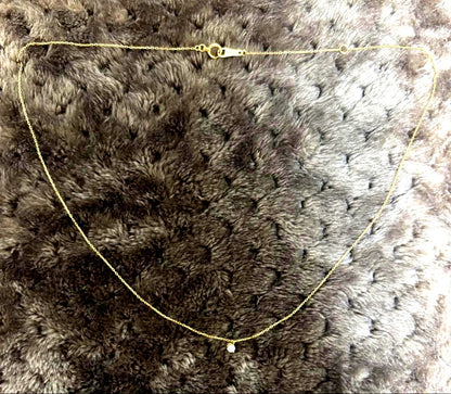 Kuro Law Diamond Necklace in 18K yellow gold with 0.05ct diamonds and 40 cm chain on white background