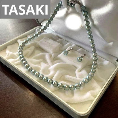 Tasaki Akoya gray pearl necklace and matching blue silver earrings set with rainbow luster