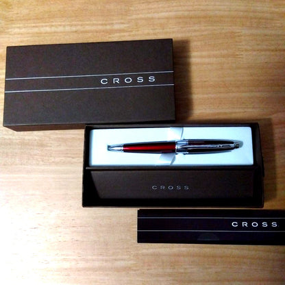 Cross Apogee silver metal ballpoint pen with branded body and slightly worn outer box