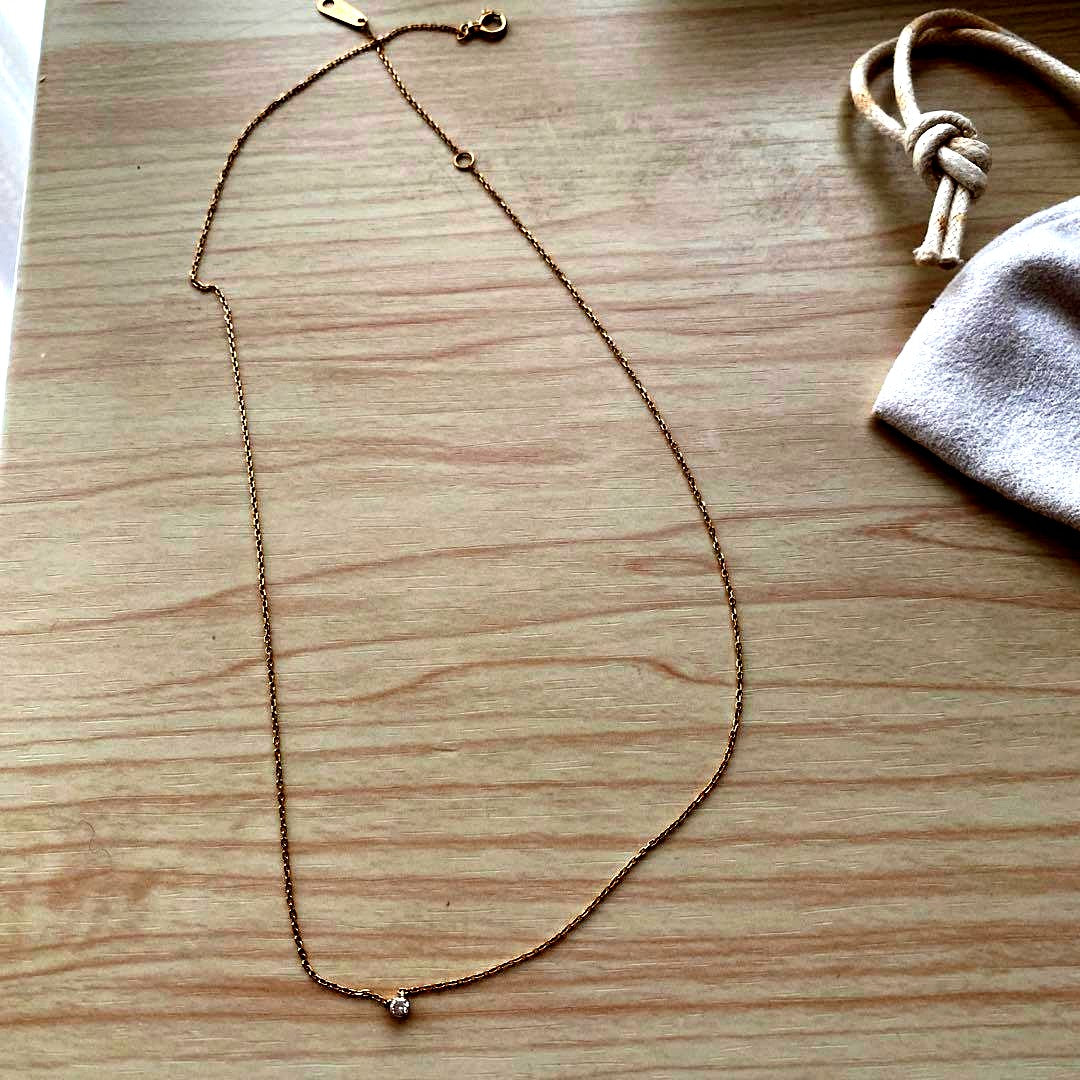 Agete diamond necklace in 10K yellow gold with a 0.05ct single diamond pendant