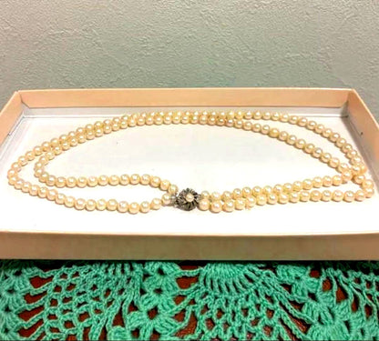 Honest Pearl 2-strand Akoya pearl necklace with silver stamped clasp on white background