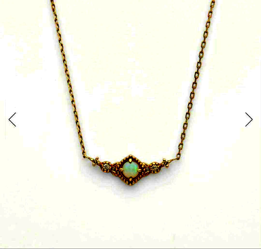 Agete Opal Necklace featuring 10 karat gold chain and diamond decoration
