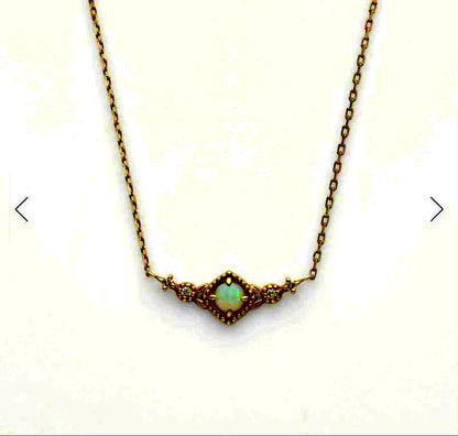 Agete Opal Necklace featuring 10 karat gold chain and diamond decoration
