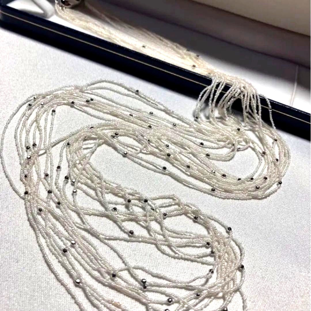 Akoya pearl 10-strand long necklace with small Keshi pearls and k18 white gold mirror-cut balls