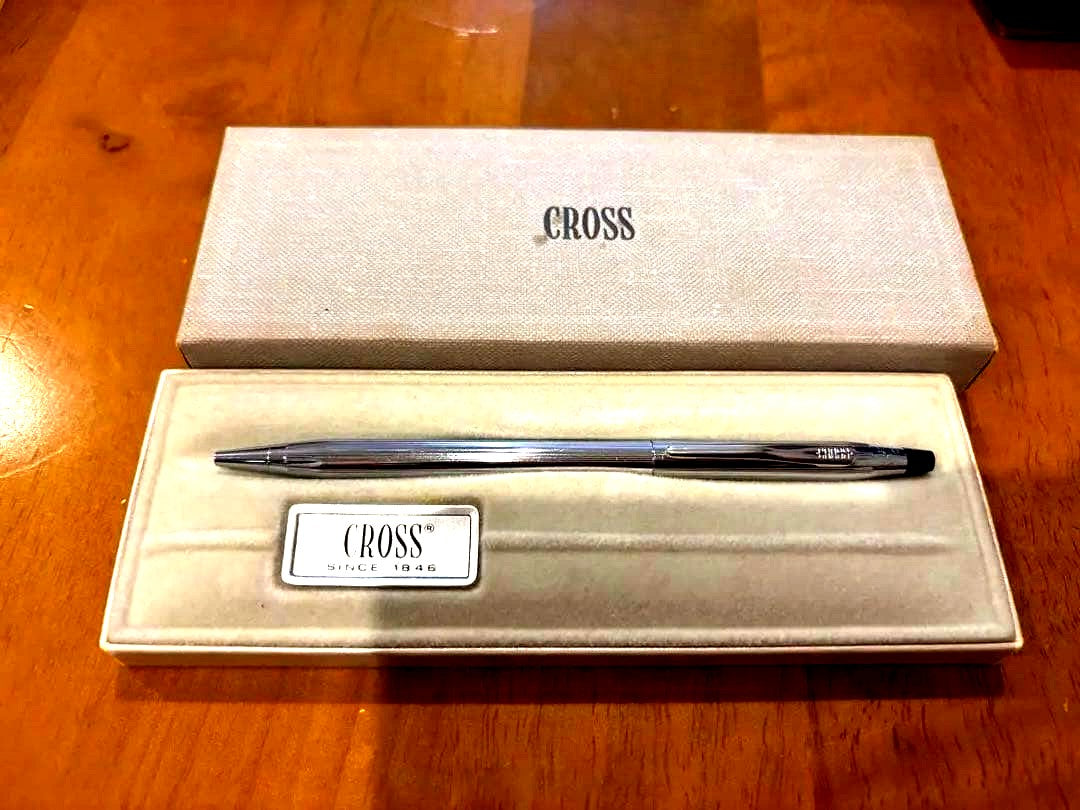 CROSS ballpoint pen shown in used condition with close-up of pen details