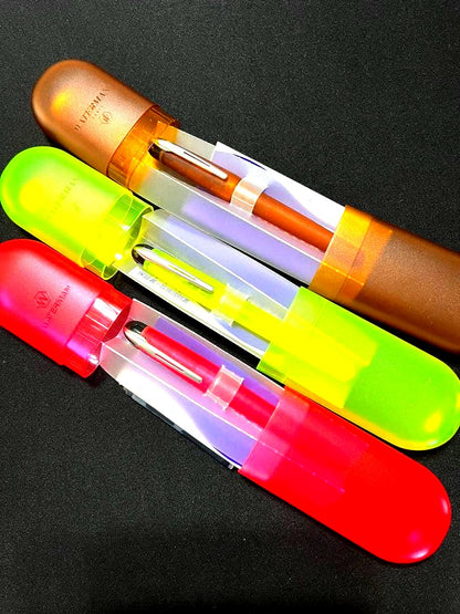 Three Waterman Cultuur Light Soft fountain pens in pink, yellow, and amber with ink cartridges included in original box