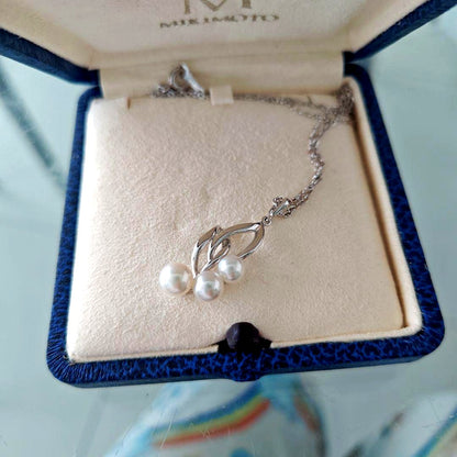 MIKIMOTO pearl necklace with three pearls and silver color chain