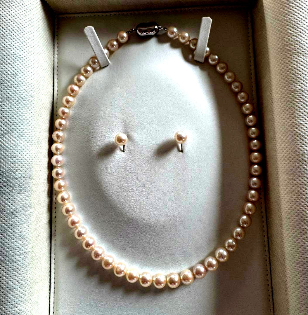 Akoya pearl necklace and earring set with round white pink Hanadama pearls and silver clasps