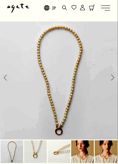 Agete pearl necklace featuring lustrous freshwater pearls displayed with gift box and guarantee card