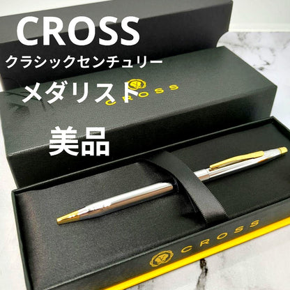 Law Cross Classic Century Medalist ballpoint pen in silver and gold with black ink and twist mechanism displayed with gift box