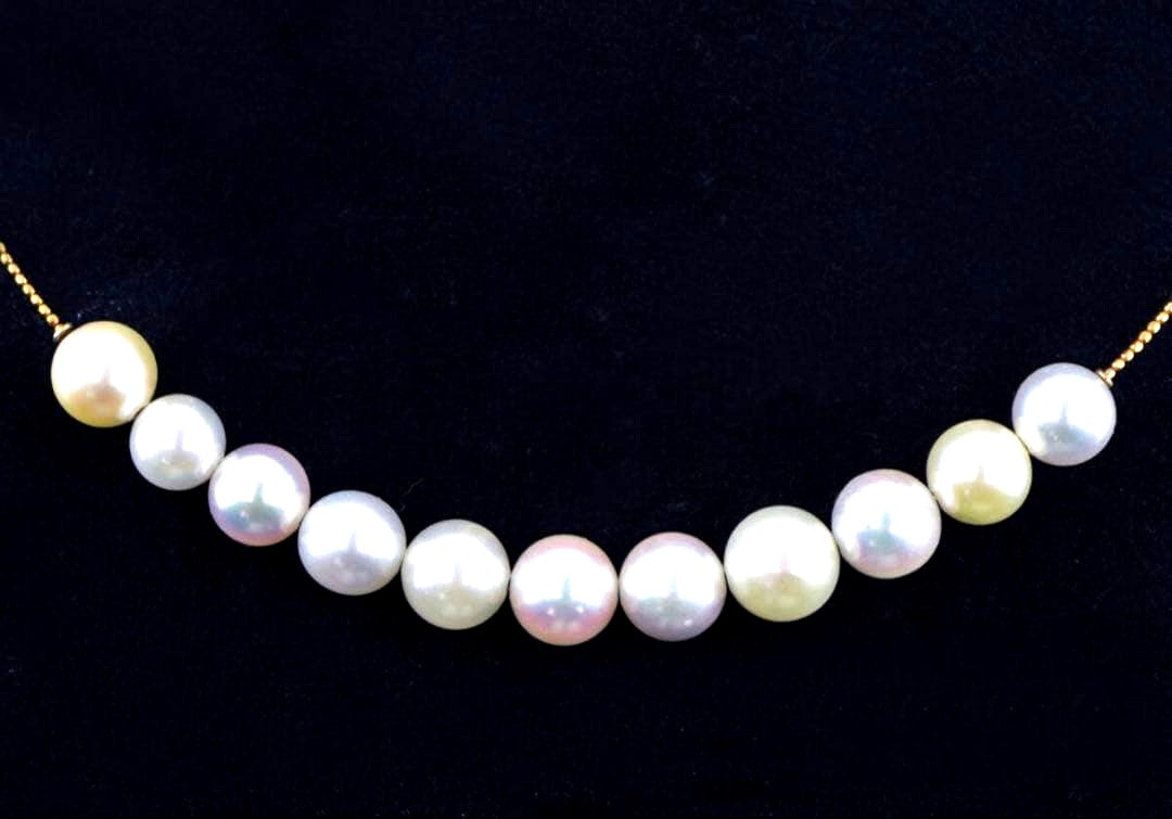 Akoya pearl necklace with 11 round pearls sized 7.5-8.5mm in white pink, gray, and champagne gold on K18 omega chain