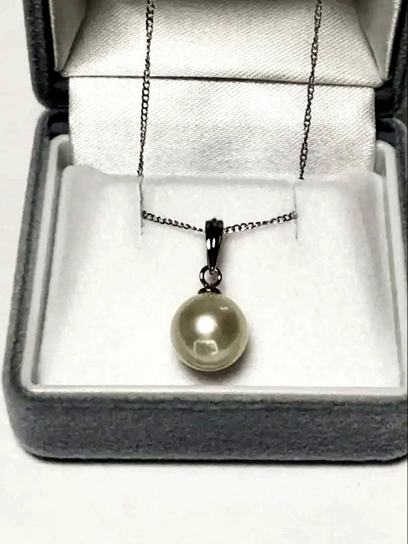White Akoya Pearl Pendant Top featuring a 9.4mm white pearl with silver pendant banger and hallmark