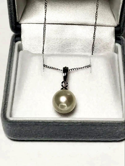 White Akoya Pearl Pendant Top featuring a 9.4mm white pearl with silver pendant banger and hallmark