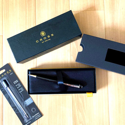 Black CROSS ballpoint pen with replacement ink refill in original box