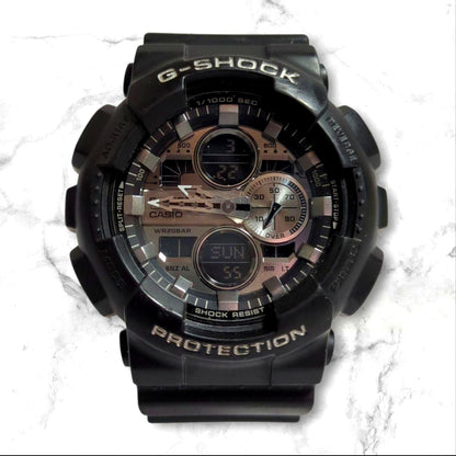 Casio G-Shock GA-140GM black watch showing front dial with durable resin strap