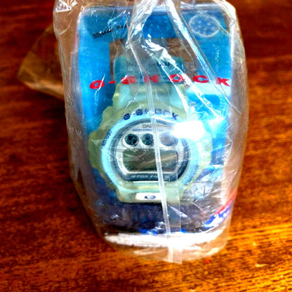 Casio G-Shock DW6900WC-2AT Euphoria Blue digital watch with visible fading and dirt, vintage Japan import