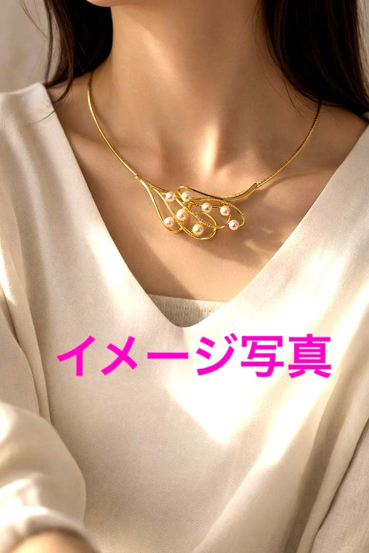 Akoya pearl silver choker necklace with gold color accents and matching brooch measuring 66mm by 30mm