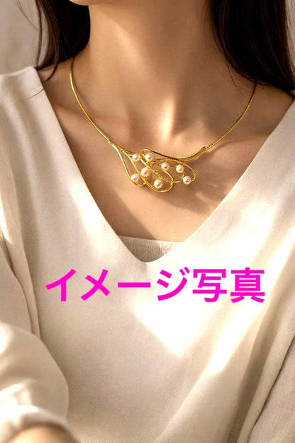 Akoya pearl silver choker necklace with gold color accents and matching brooch measuring 66mm by 30mm