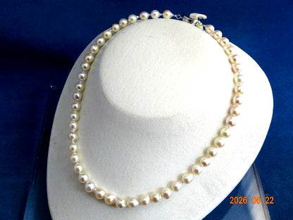 Akoya Pearl Necklace featuring 7-7.5mm baroque pearls in white, pink, blue, and cream colors with one-touch clasp