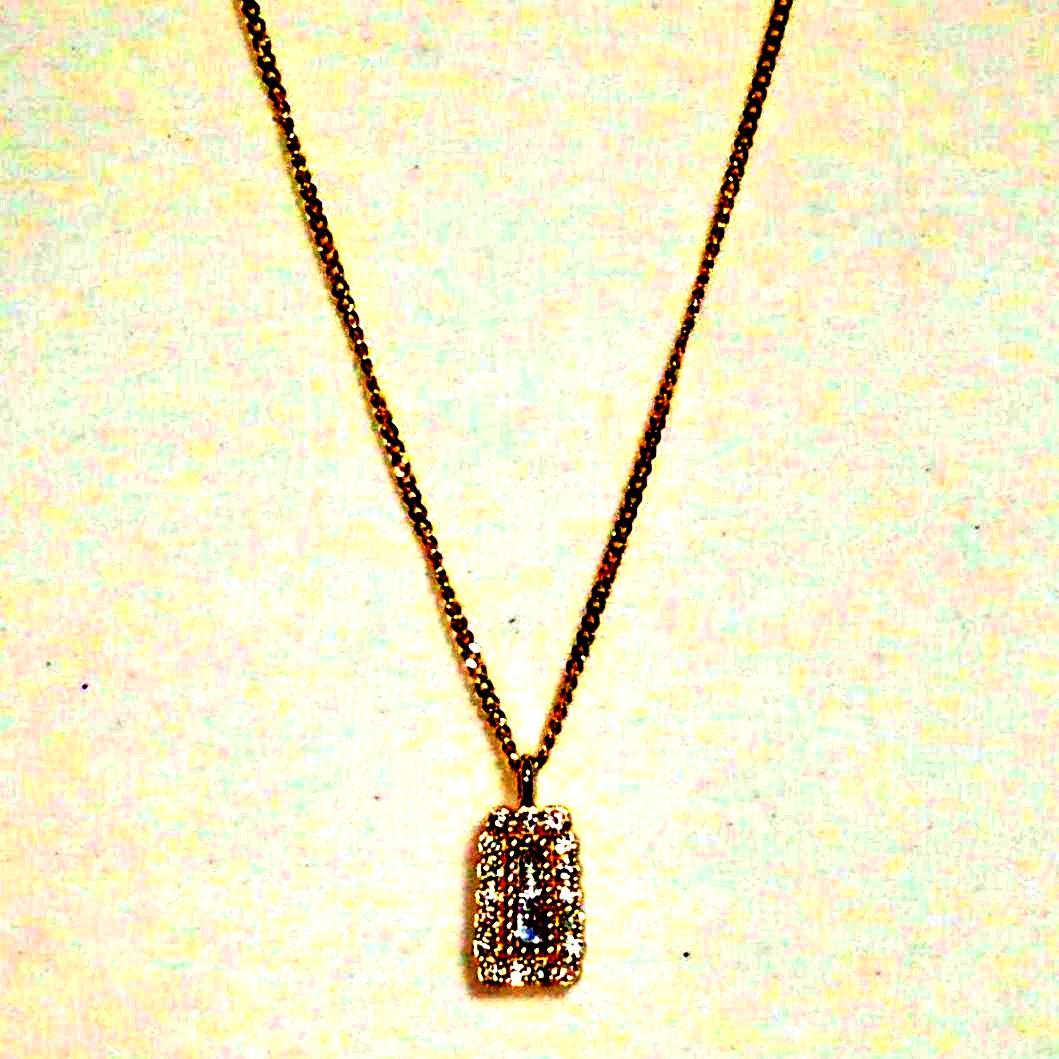 agete K18 gold necklace featuring a delicate chain with a sparkling diamond pendant