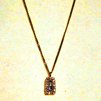 agete K18 gold necklace featuring a delicate chain with a sparkling diamond pendant