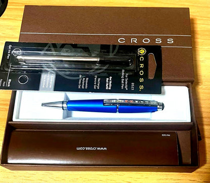 Kuro Cross rollerball pen in blue with included refill, showing a classic design
