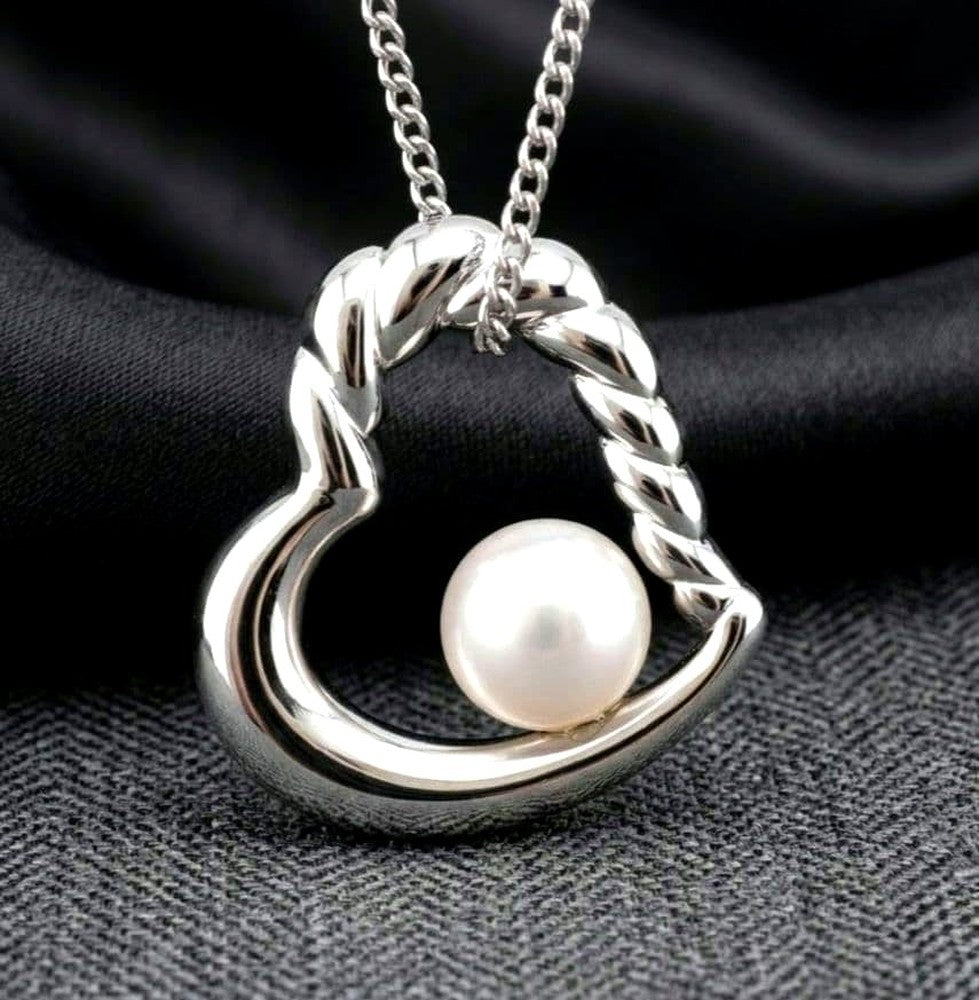 TASAKI Open Heart Pearl Necklace in silver with a 6.3mm round pearl pendant