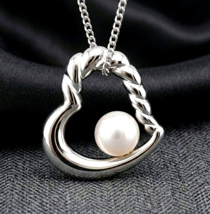 TASAKI Open Heart Pearl Necklace in silver with a 6.3mm round pearl pendant