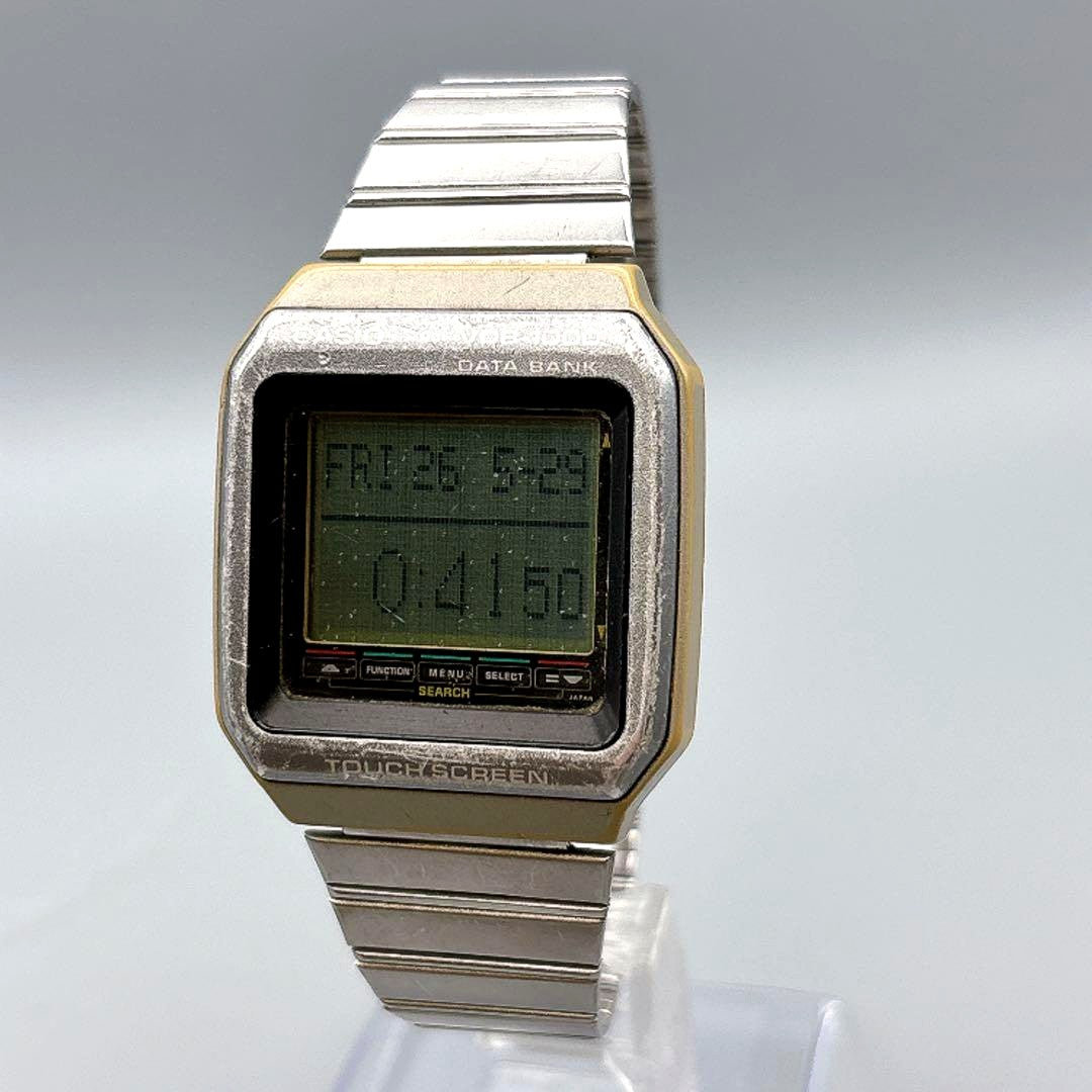 Casio VDB-1000 Data Bank watch with touch screen and replaced battery showing a black square face and futuristic design