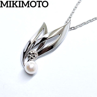 MIKIMOTO Baby Pearl Necklace with 5.1mm pearls and chrysanthemum mon pendant on silver chain