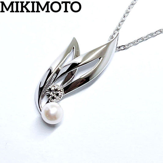 MIKIMOTO Baby Pearl Necklace with 5.1mm pearls and chrysanthemum mon pendant on silver chain