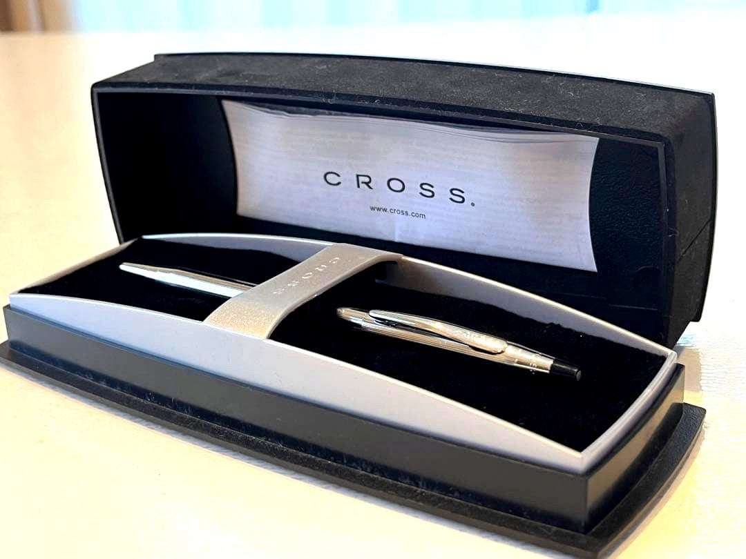 Cross Cross ballpoint pen with black case showing slight dent on case surface