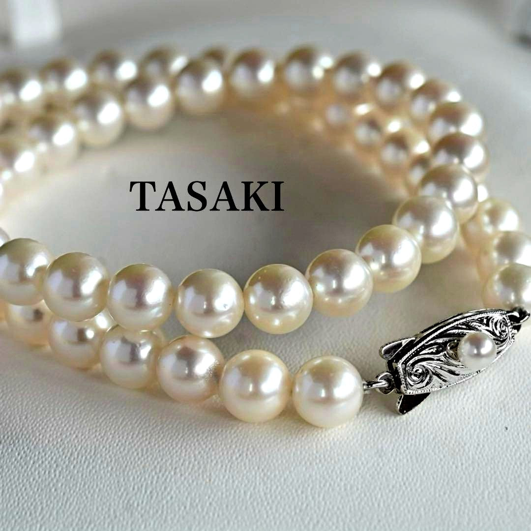 Takatsuki Akoya pearl necklace with 7.0mm round pearls and silver clasp on a white background