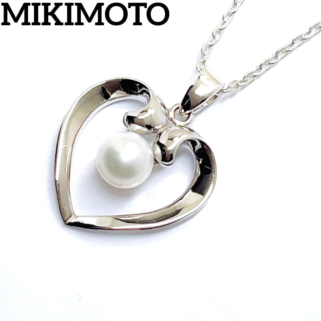Mikimoto pearl necklace with heart motif featuring 5.4mm pearls on a 46cm silver chain