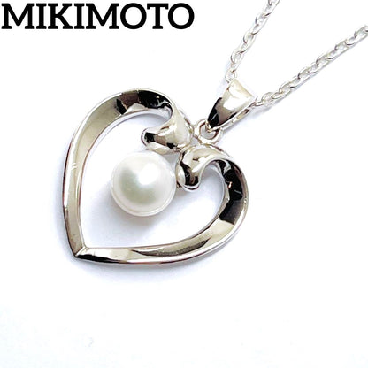 Mikimoto pearl necklace with heart motif featuring 5.4mm pearls on a 46cm silver chain